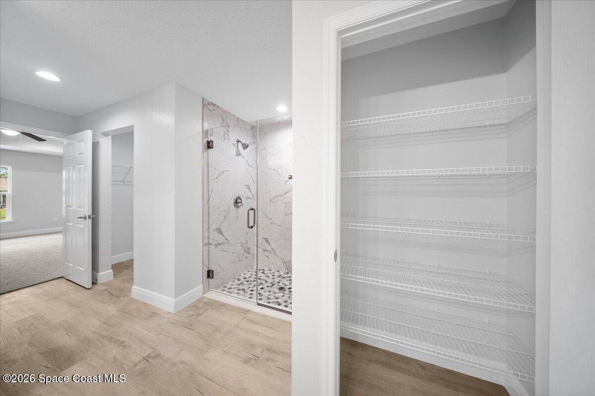 533 Fellenz Street Palm Bay, FL 32908 - Photo 30 of 42 30. Primary Bathroom:Linen Closet
