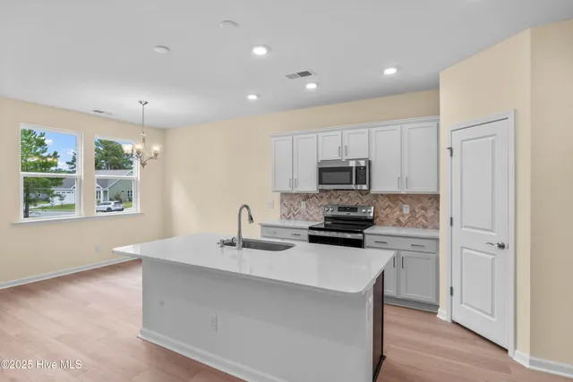 $349,900 | 658 Edgeside Drive Southeast, Bolivia, NC 28422