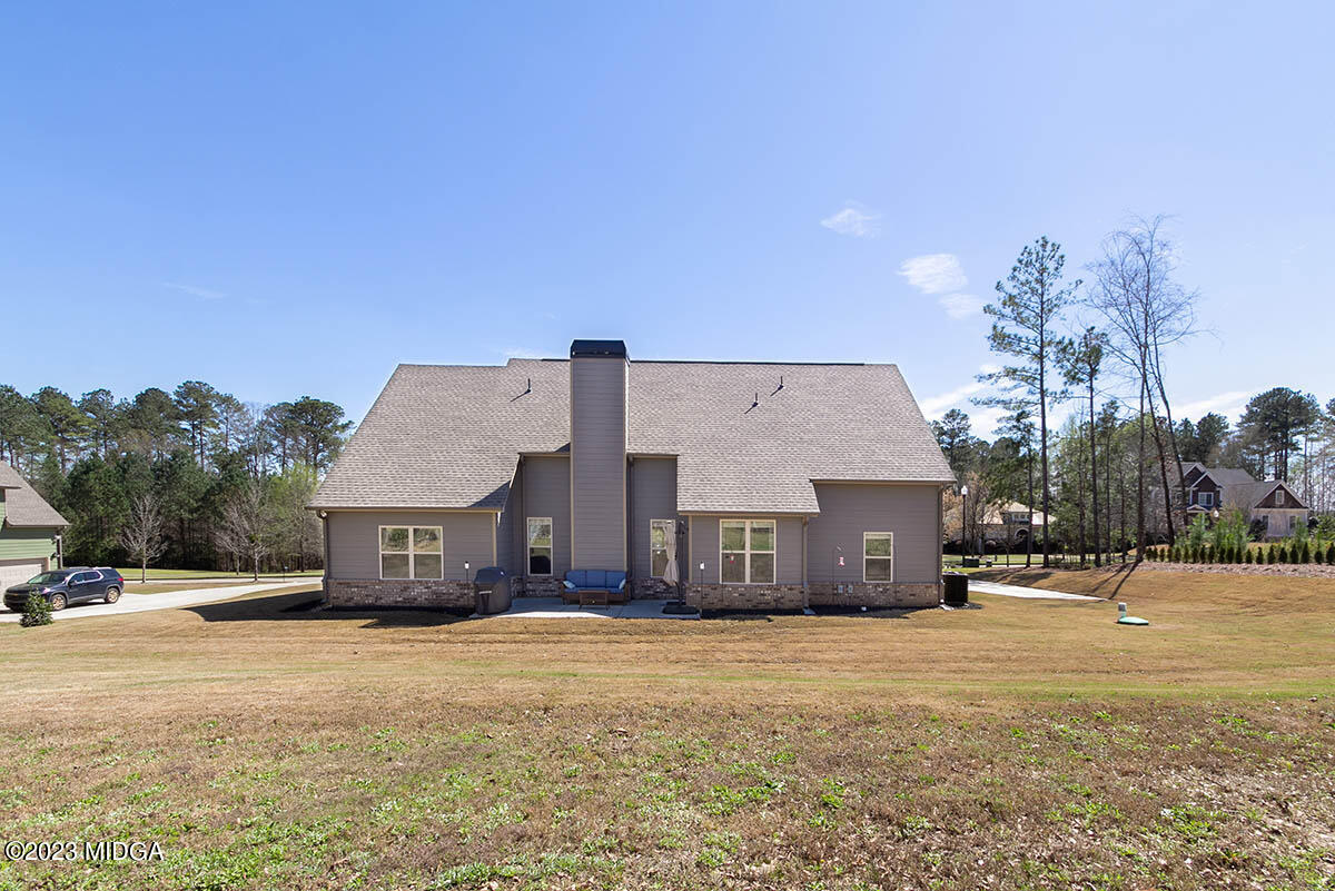 150 Homestead Circle Forsyth, GA 31029 - Photo 27 of 30 a view of a house with a yard