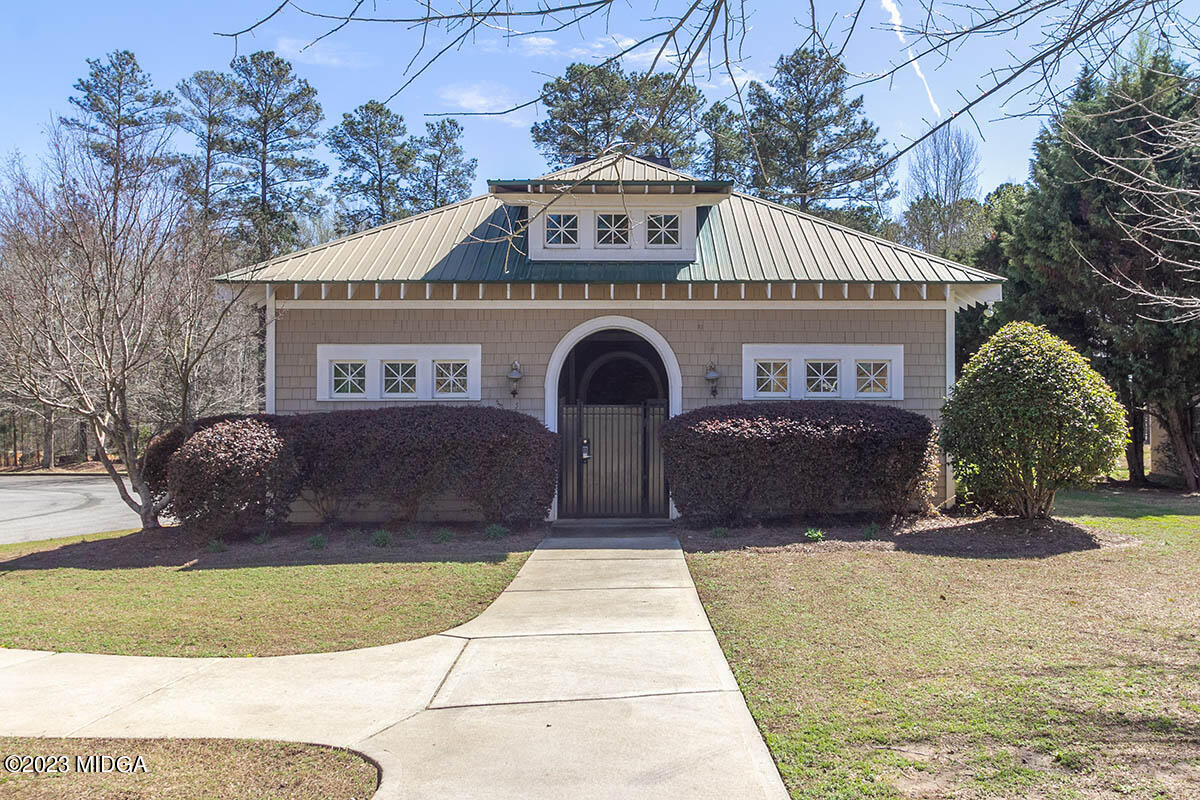 150 Homestead Circle Forsyth, GA 31029 - Photo 30 of 30 a front view of a house with garden