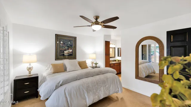 a bedroom with a bed and a closet