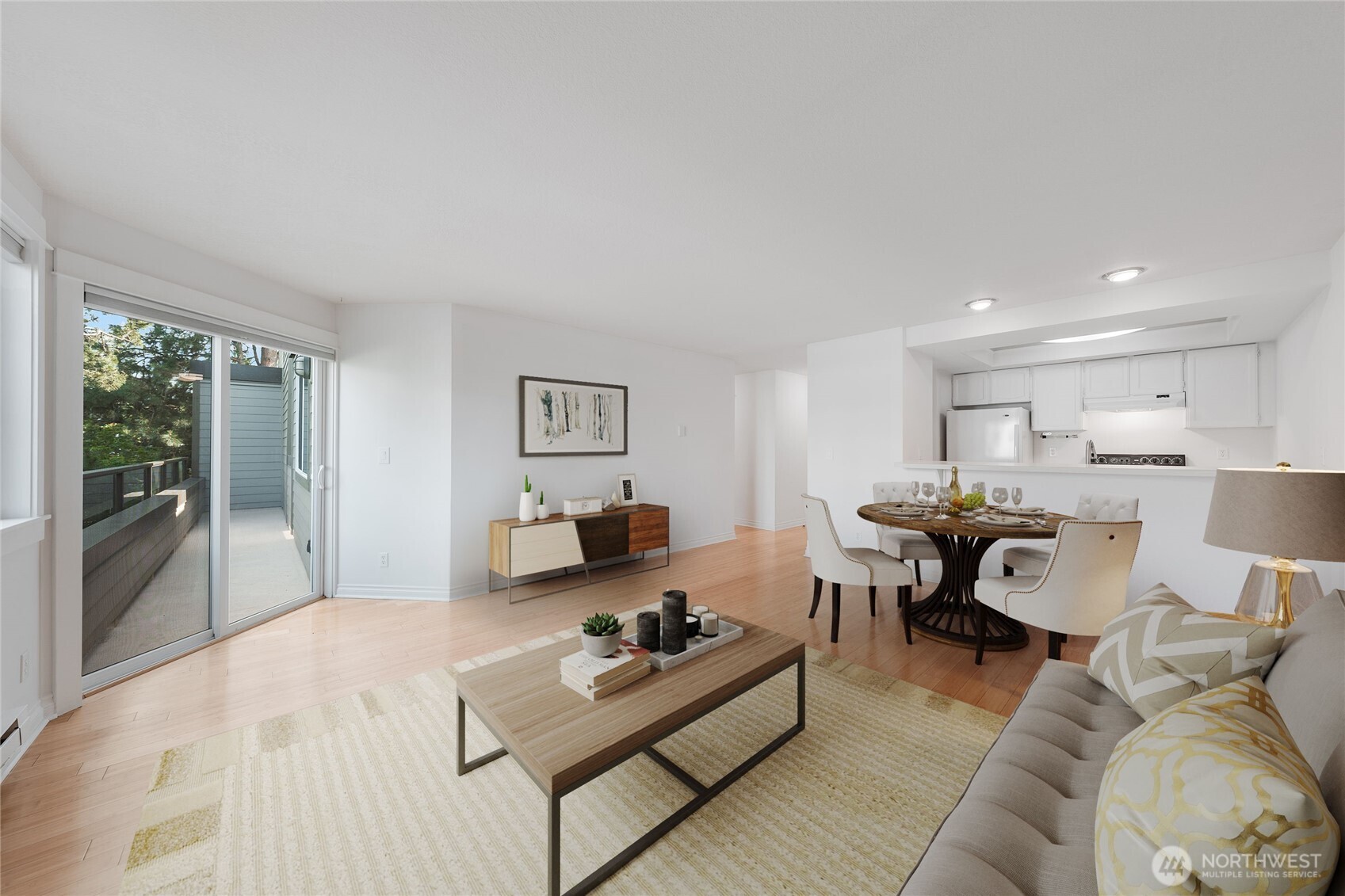 6055 35th Avenue Southwest, Unit 308 Seattle, WA 98126 - Photo 2 of 39 a living room with furniture and a table
