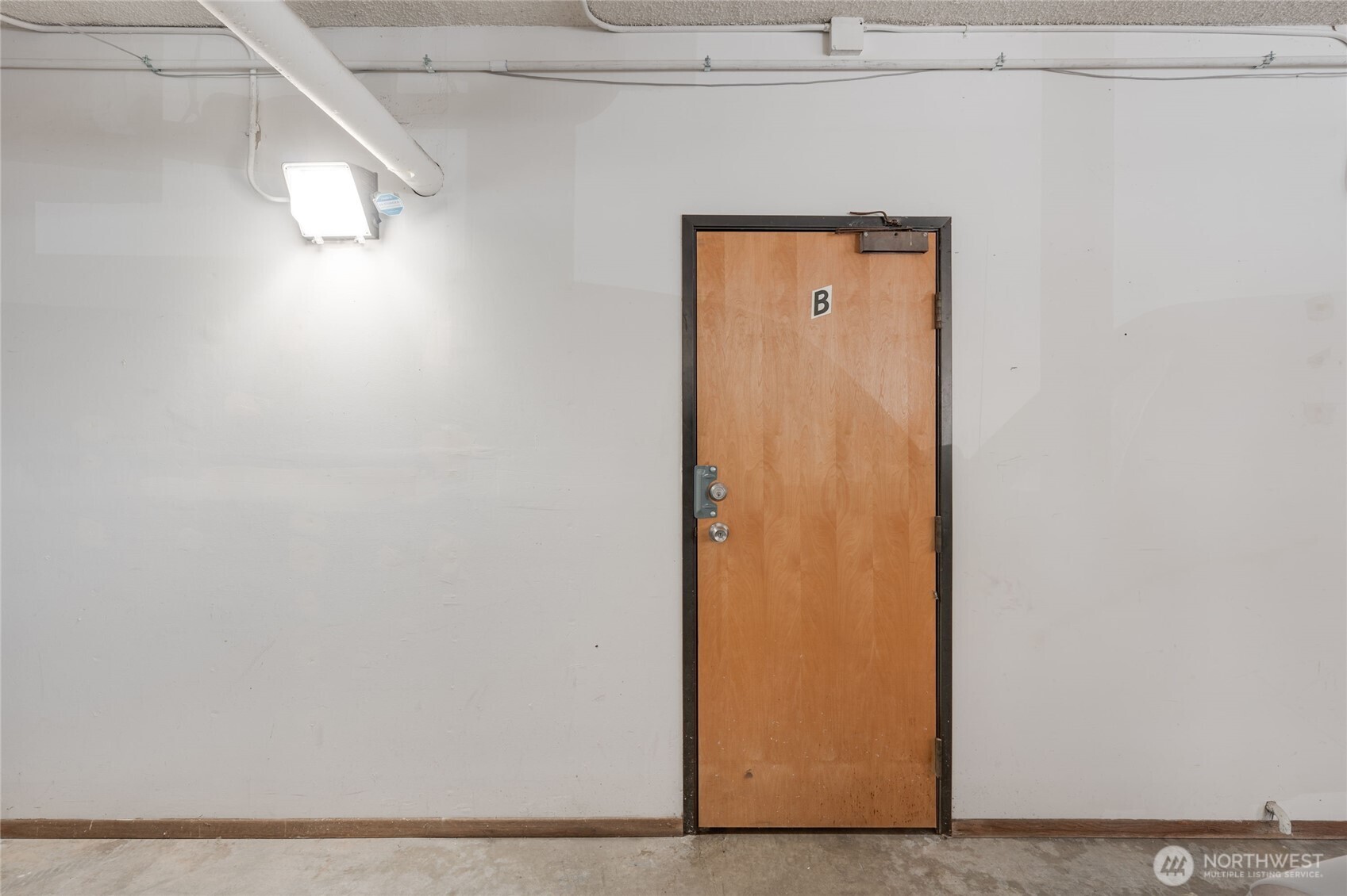 6055 35th Avenue Southwest, Unit 308 Seattle, WA 98126 - Photo 39 of 39 a view of a front door