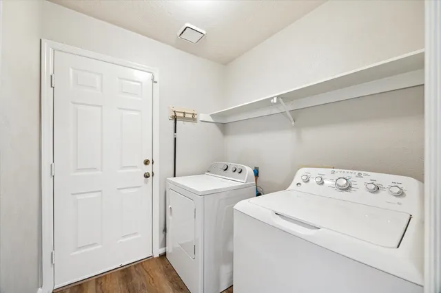 a utility room with dryer and washer