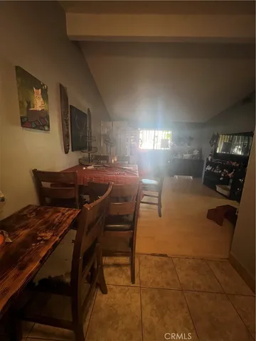 a view of hallway with seating area