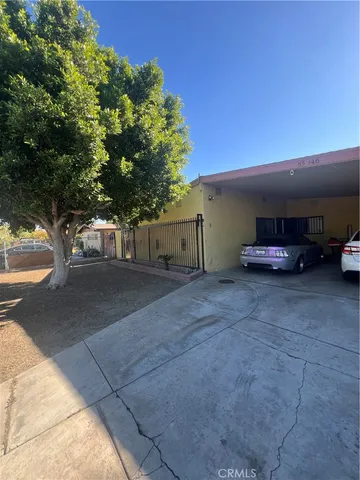 a view of street with parked cars