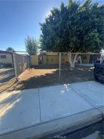 a view of a terrace with a yard