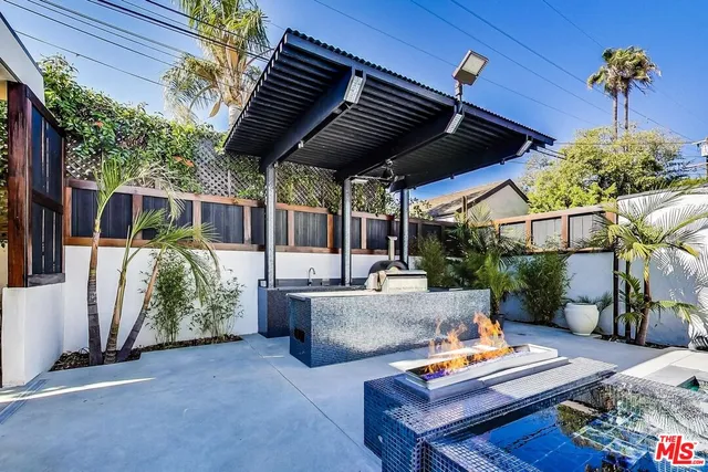 a outdoor living space with furniture and garden view