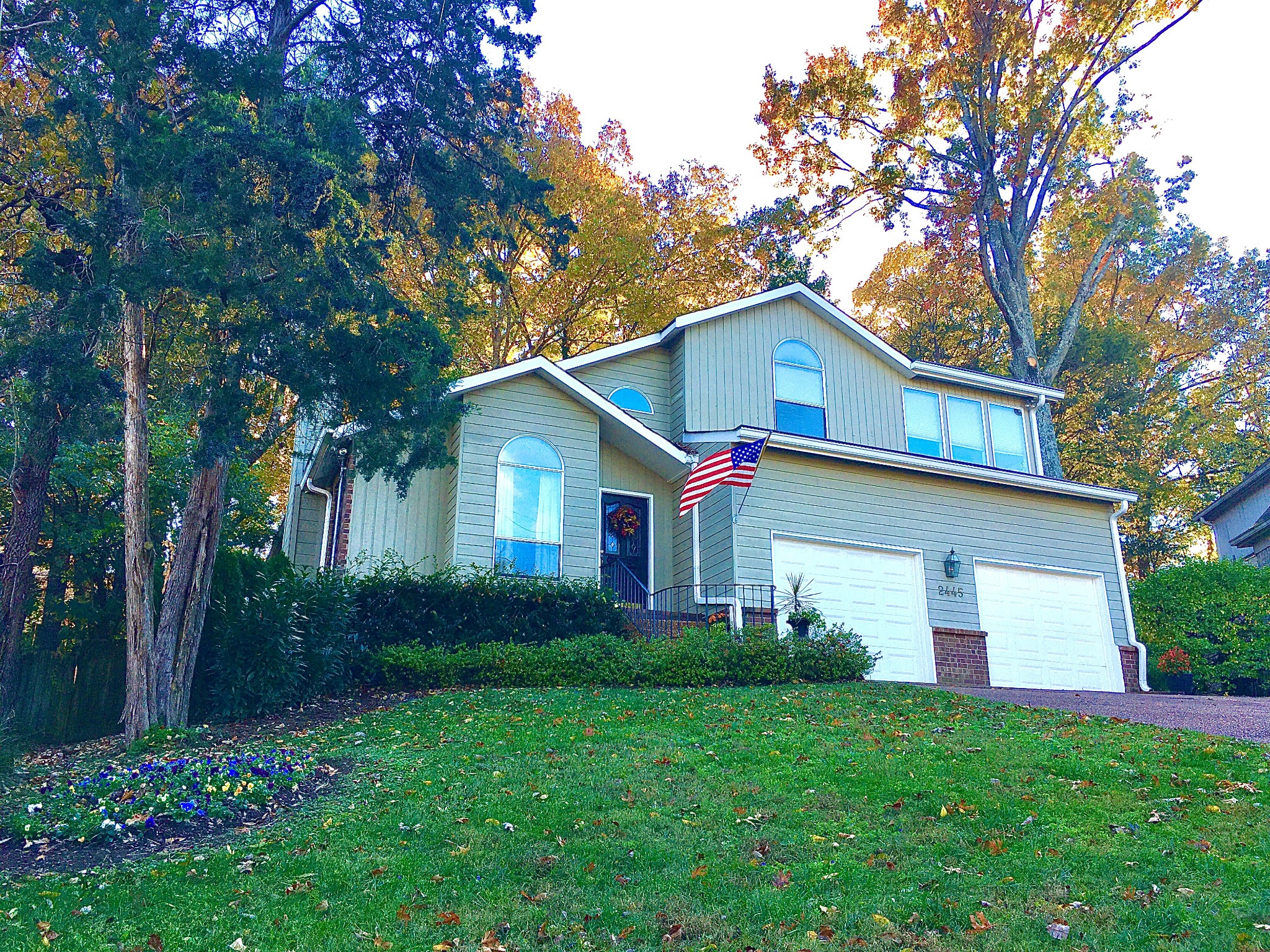 2445 Ravine Drive Nashville, TN 37217 - Photo 1 of 26 a front view of house with a garden