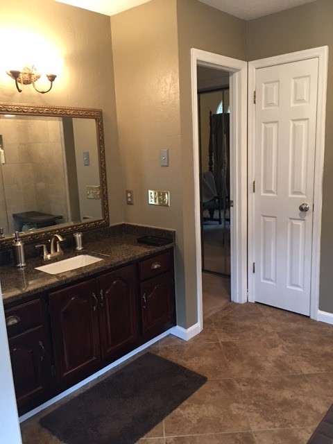 2445 Ravine Drive Nashville, TN 37217 - Photo 18 of 26 a bathroom with a sink and a mirror