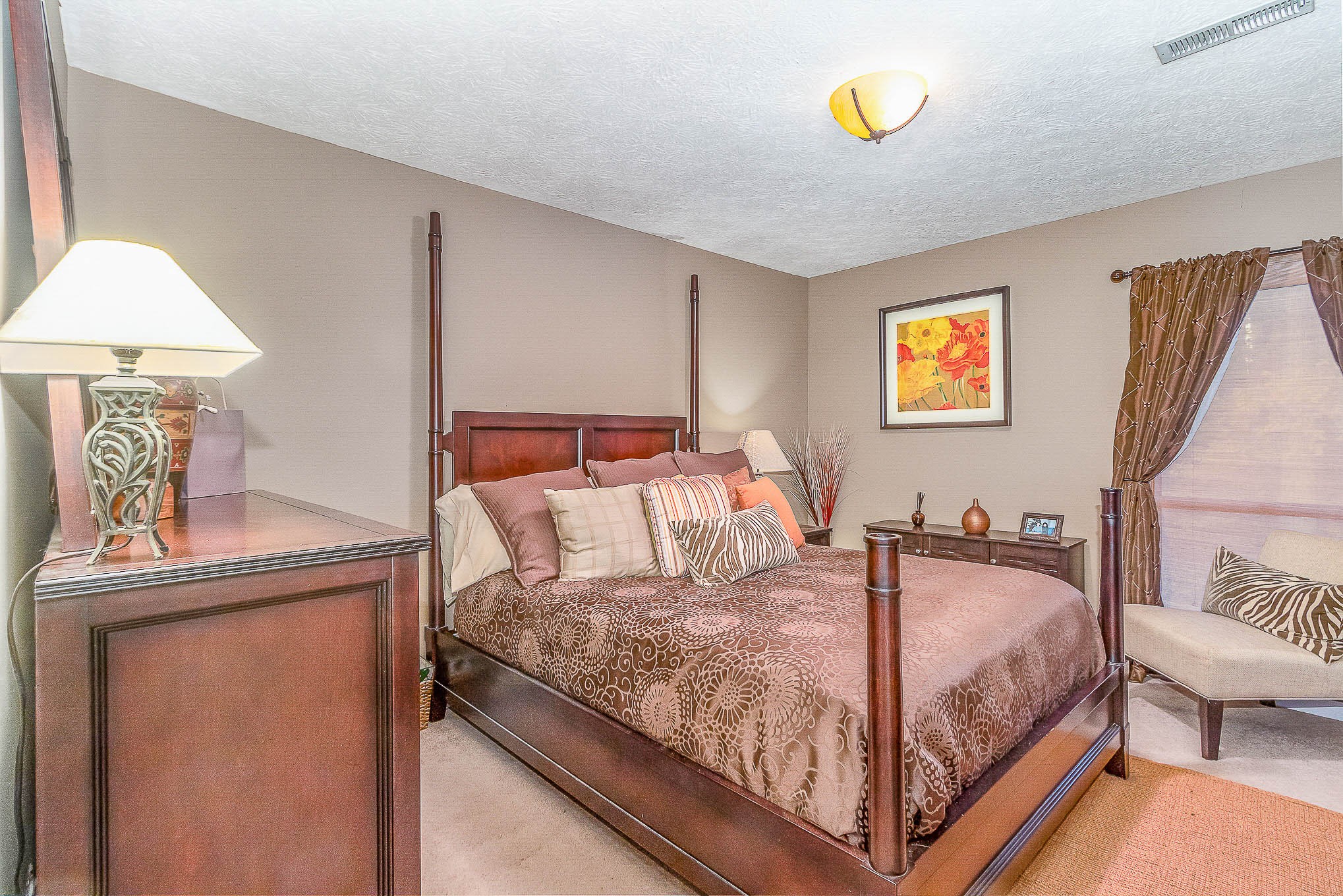 2445 Ravine Drive Nashville, TN 37217 - Photo 21 of 26 a bedroom with a bed and a table in it