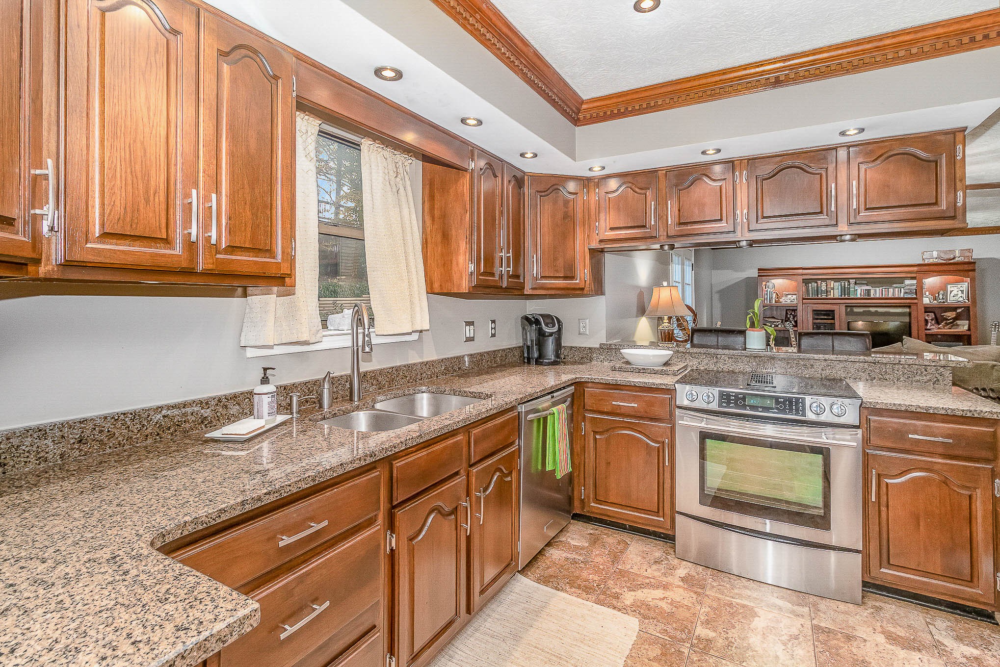2445 Ravine Drive Nashville, TN 37217 - Photo 7 of 26 a kitchen with stainless steel appliances granite countertop a sink and cabinets