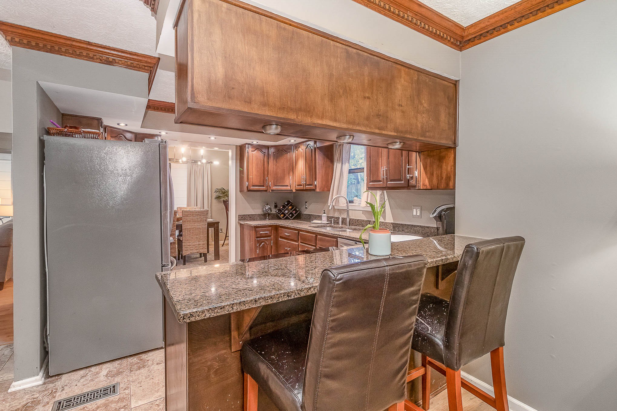 2445 Ravine Drive Nashville, TN 37217 - Photo 10 of 26 a kitchen with a table and chairs