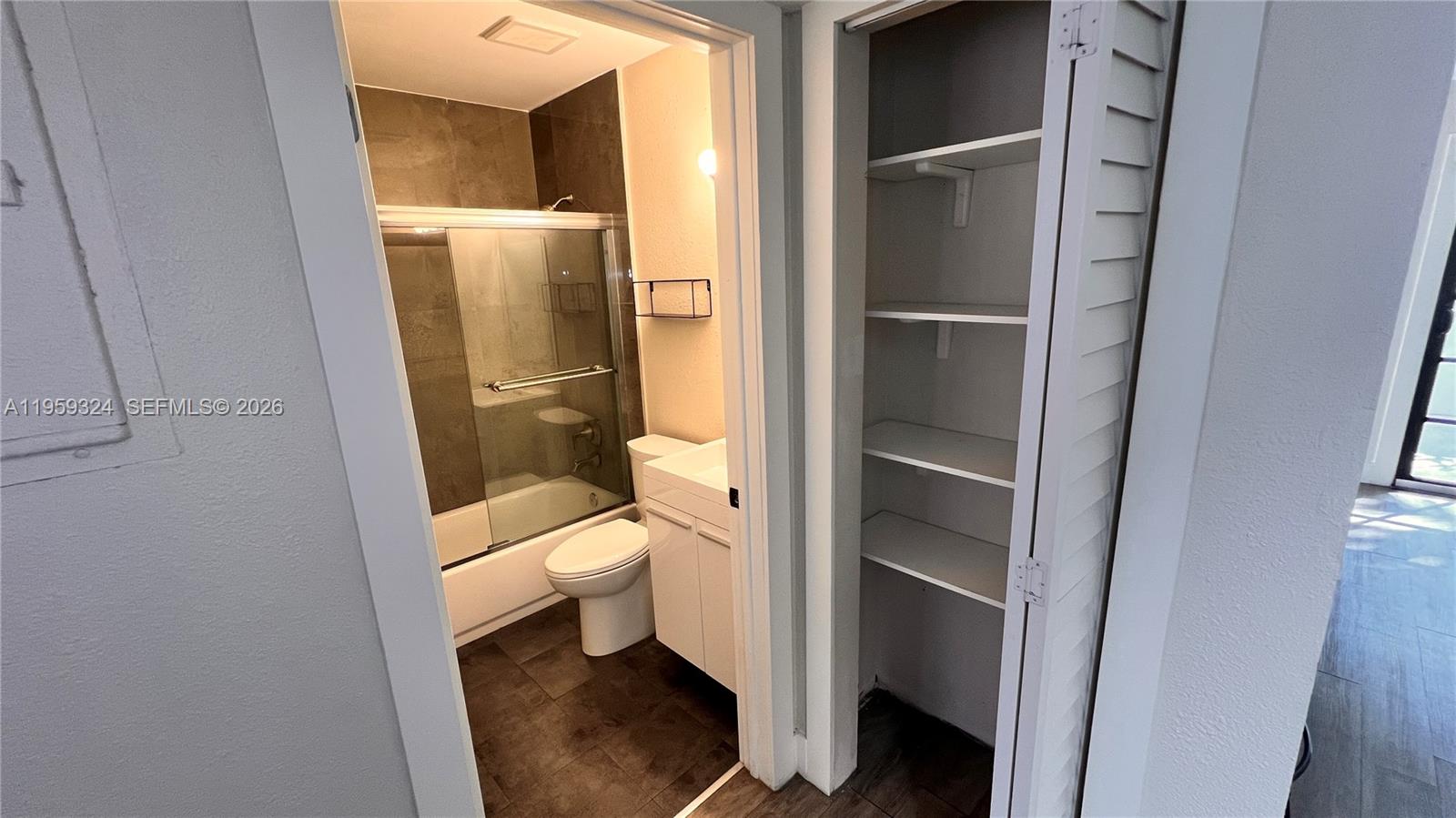 3538 Southwest 17th Street, Unit 1B Miami, FL 33145 - Photo 8 of 27 living room closet