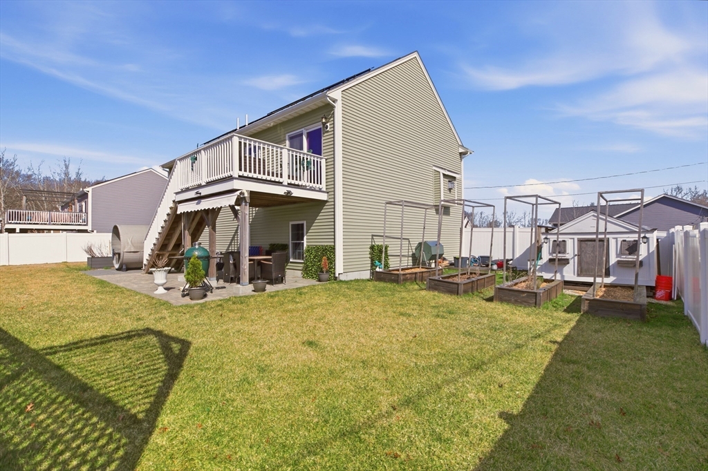 341 Courtney Street Fall River, MA 02720 - Photo 36 of 39 a view of a house with swimming pool and sitting area