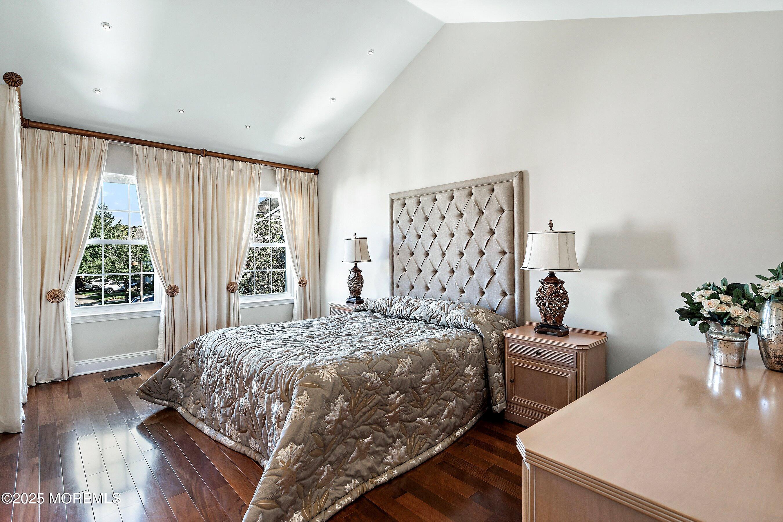 32 Bristel Road, Unit 212 Holmdel, NJ 07733 - Photo 25 of 61 a bedroom with a bed and a potted plant