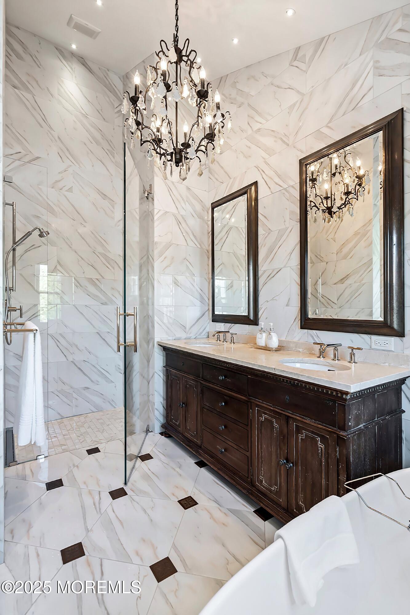 32 Bristel Road, Unit 212 Holmdel, NJ 07733 - Photo 31 of 61 a bathroom with a double vanity sink mirror and bathtub