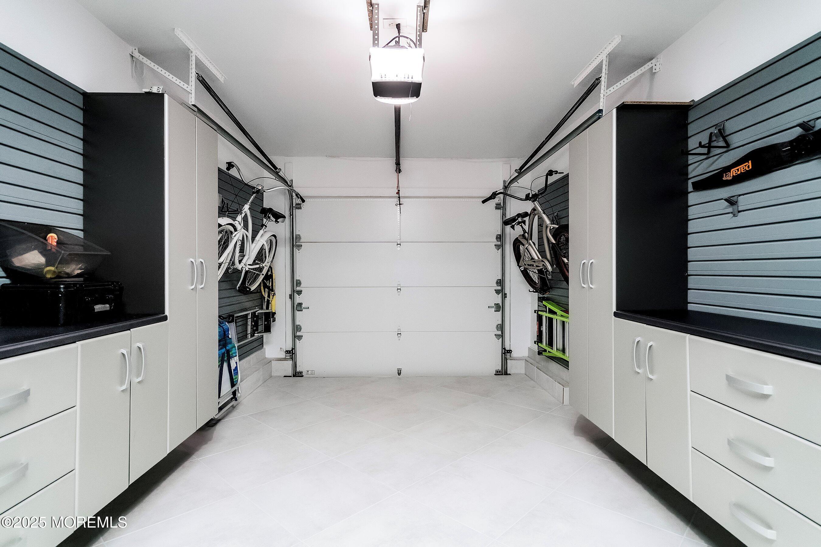 32 Bristel Road, Unit 212 Holmdel, NJ 07733 - Photo 38 of 61 a view of a garage with stairs