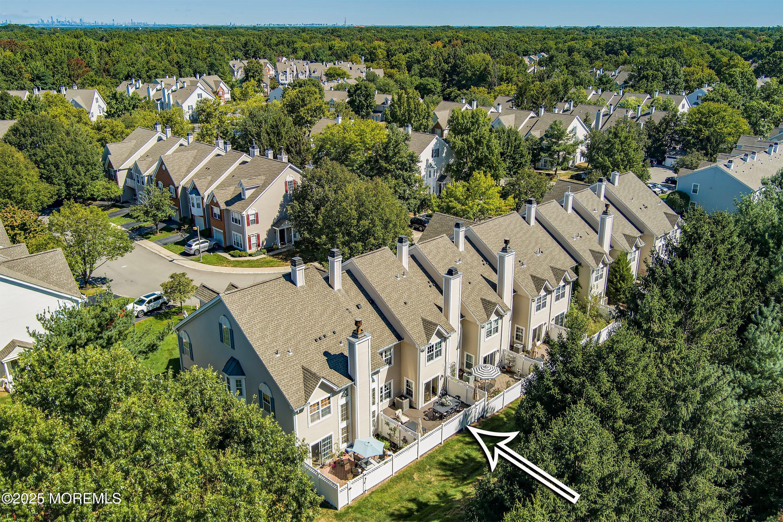 32 Bristel Road, Unit 212 Holmdel, NJ 07733 - Photo 48 of 61 an aerial view of a house with a yard