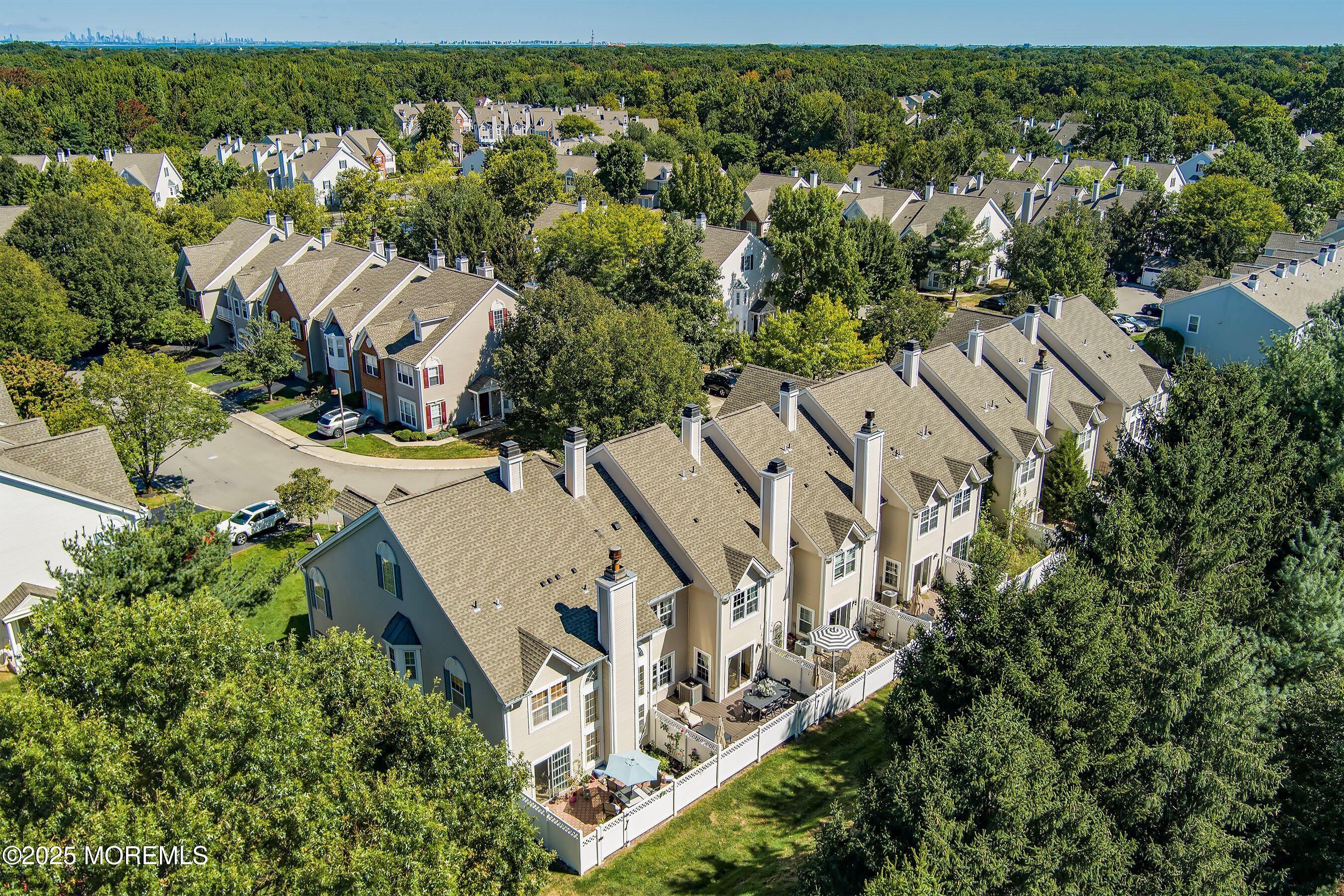 32 Bristel Road, Unit 212 Holmdel, NJ 07733 - Photo 57 of 61 an aerial view of a house with a yard