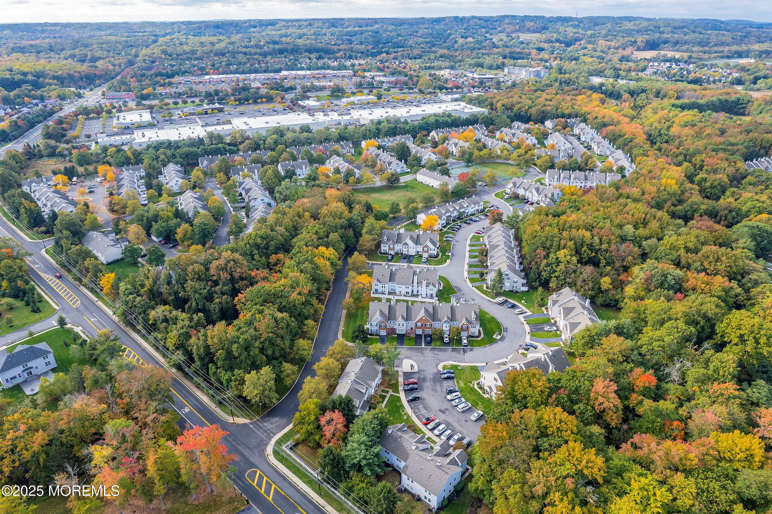 32 Bristel Road, Unit 212 Holmdel, NJ 07733 - Photo 58 of 61 an aerial view of residential houses with outdoor space and street view