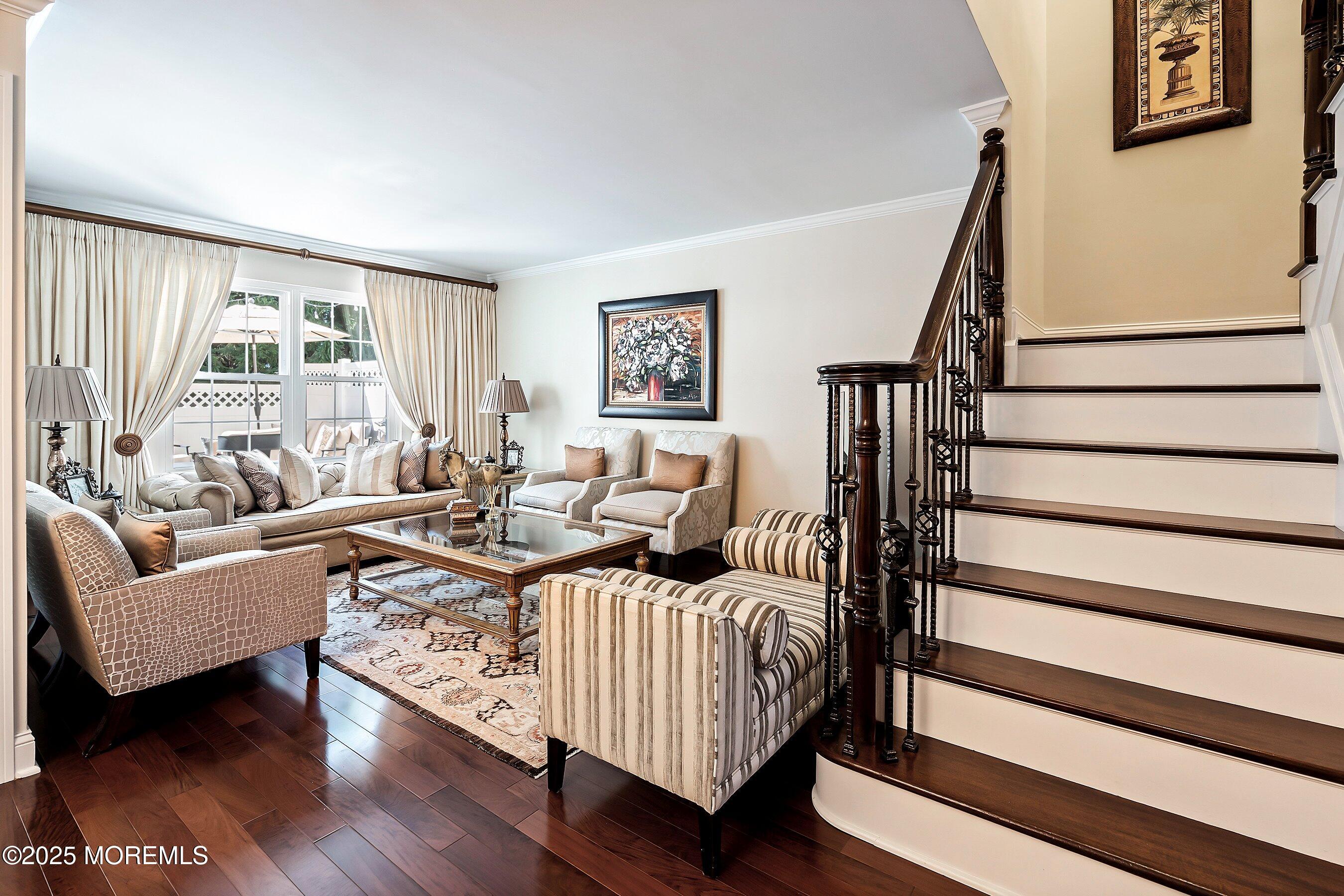 32 Bristel Road, Unit 212 Holmdel, NJ 07733 - Photo 10 of 61 a living room with furniture and a large window