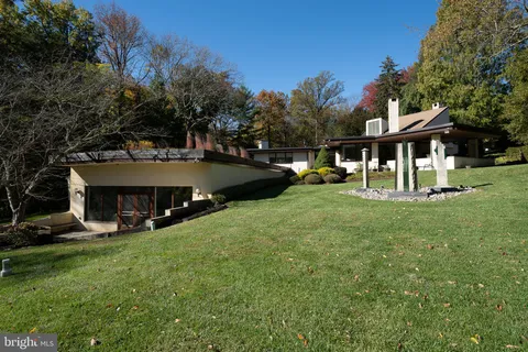 a view of a house with a big yard