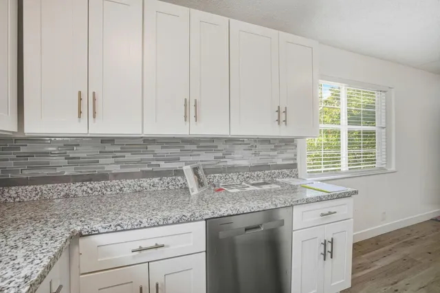 a view of a room that has a window in it