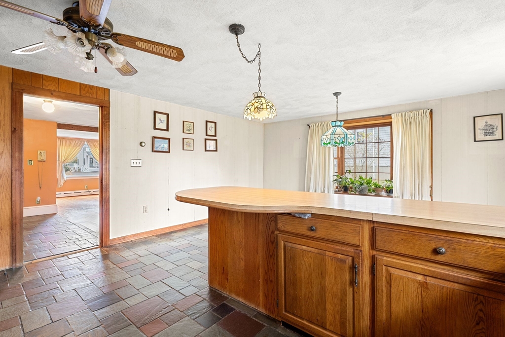 36 Smith Road Hingham, MA 02043 - Photo 12 of 35 a view of a kitchen with a sink a window and appliances