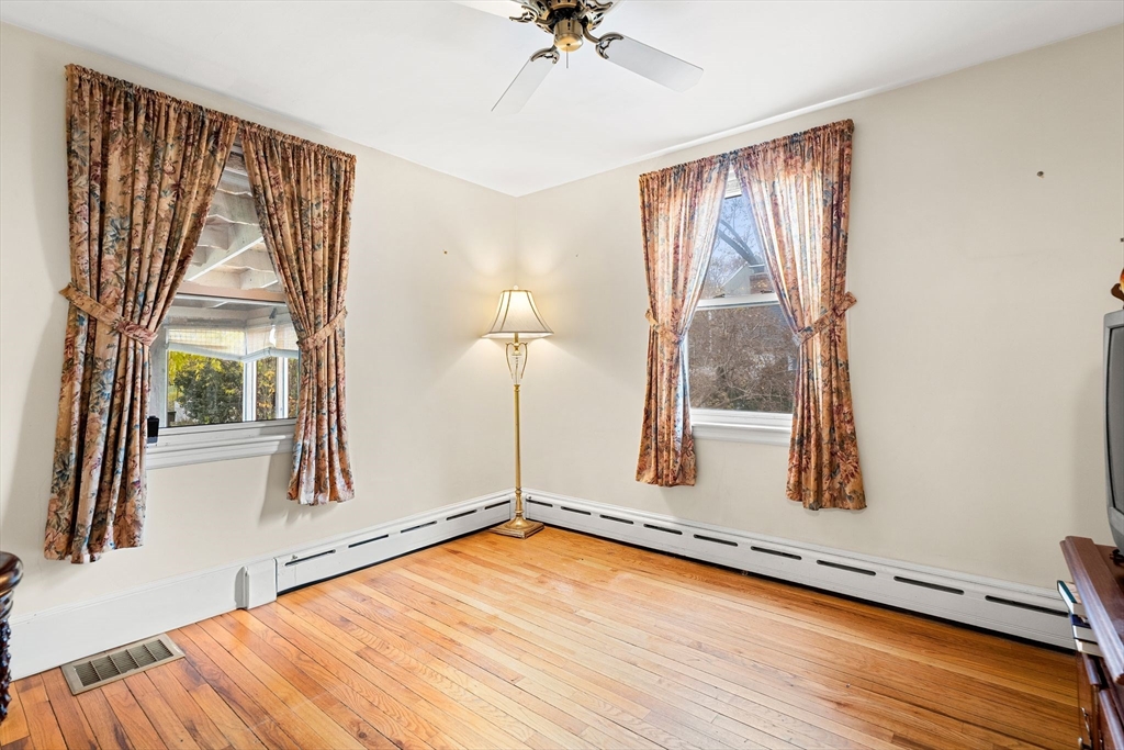 36 Smith Road Hingham, MA 02043 - Photo 17 of 35 a view of an empty room with a window