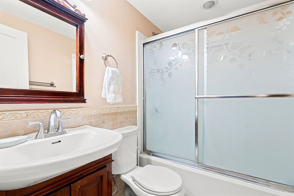 36 Smith Road Hingham, MA 02043 - Photo 18 of 35 a bathroom with a sink vanity mirror and toilet