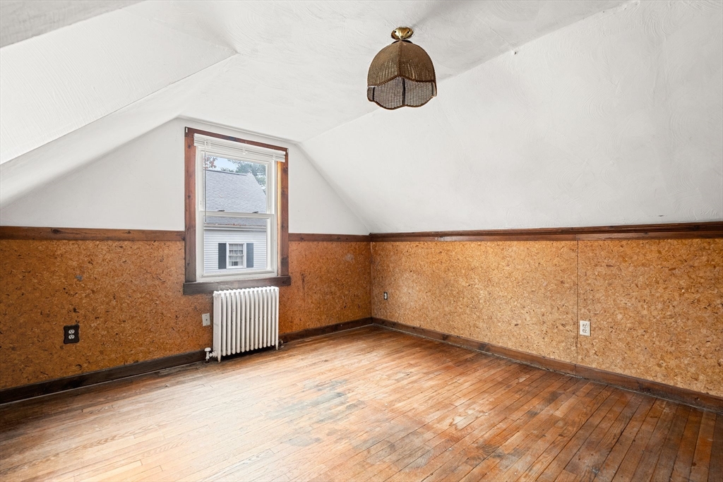 36 Smith Road Hingham, MA 02043 - Photo 23 of 35 a view of an empty room with a window