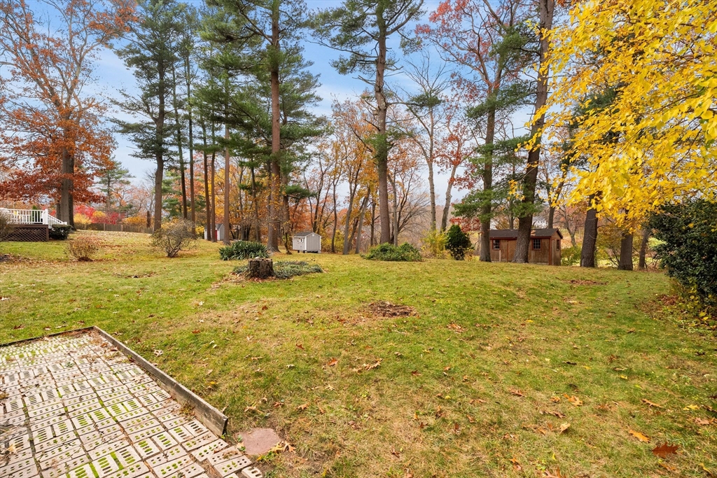 36 Smith Road Hingham, MA 02043 - Photo 27 of 35 a backyard of apartments with large trees