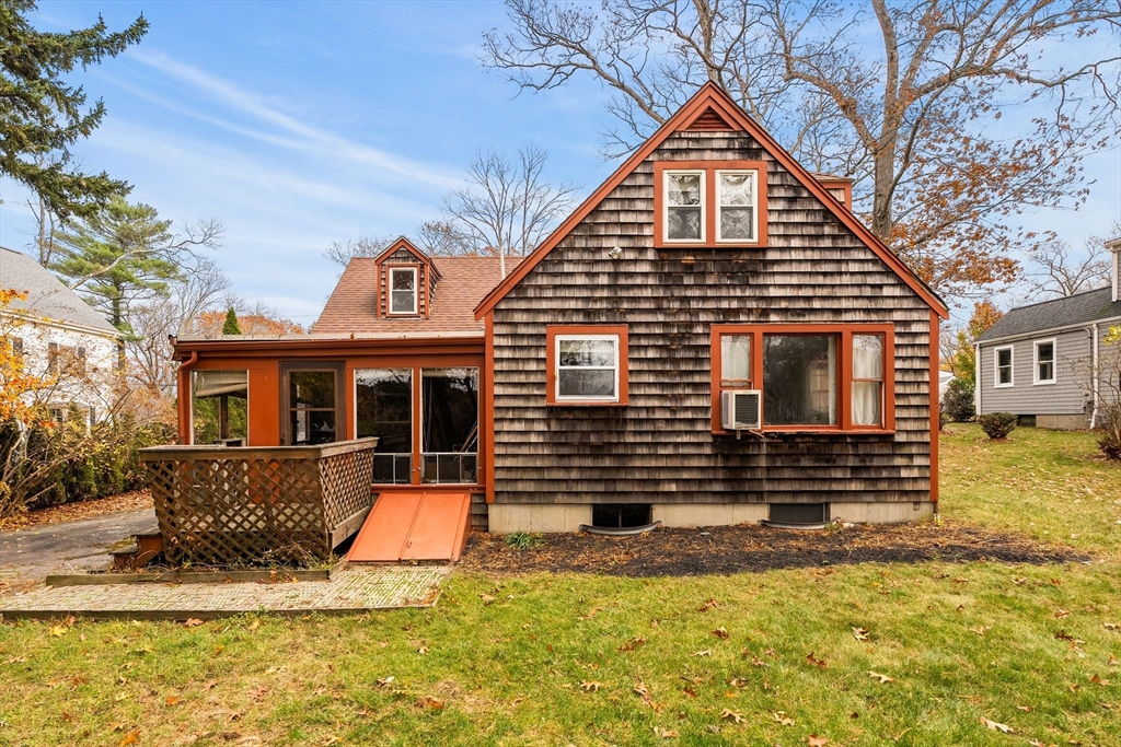 36 Smith Road Hingham, MA 02043 - Photo 29 of 35 a front view of a house with a yard