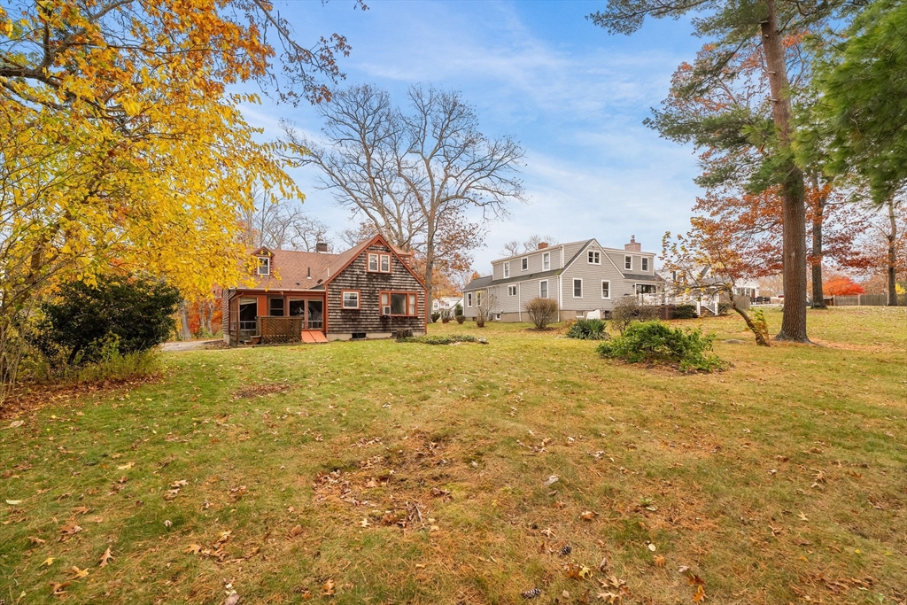 36 Smith Road Hingham, MA 02043 - Photo 30 of 35 a view of a house with a yard