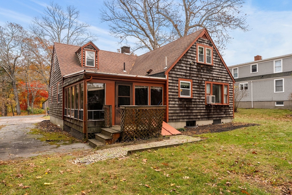 36 Smith Road Hingham, MA 02043 - Photo 31 of 35 a view of a house with a yard