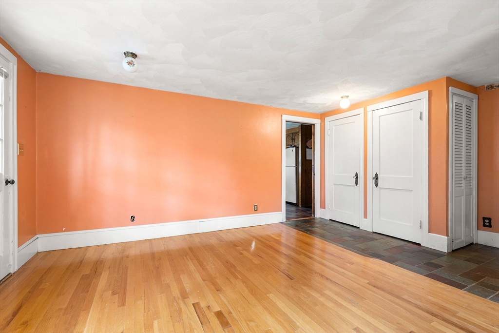 36 Smith Road Hingham, MA 02043 - Photo 8 of 35 a view of an empty room with wooden floor