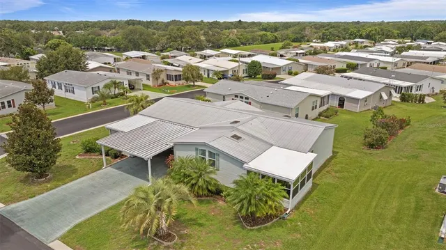 an aerial view of a house with a garden