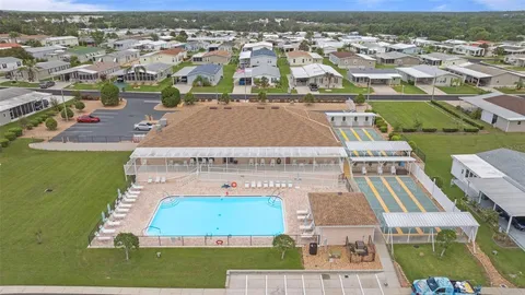 an aerial view of a house with a garden