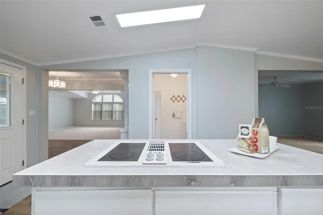 a view of a center that has a table and chairs in it