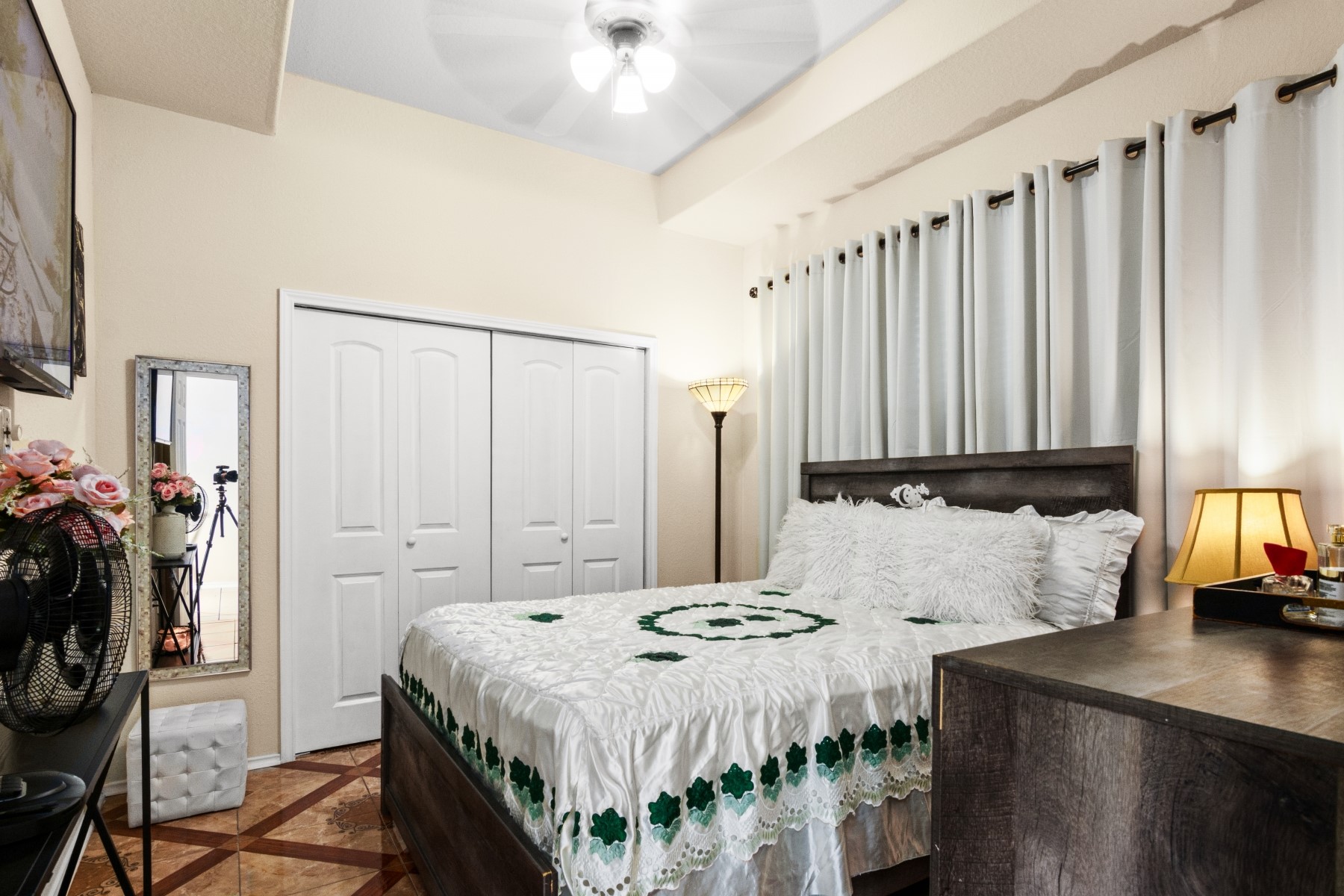 18823 Appletree Ridge Road Houston, TX 77084 - Photo 17 of 22 a bedroom that has a bed and a table in it