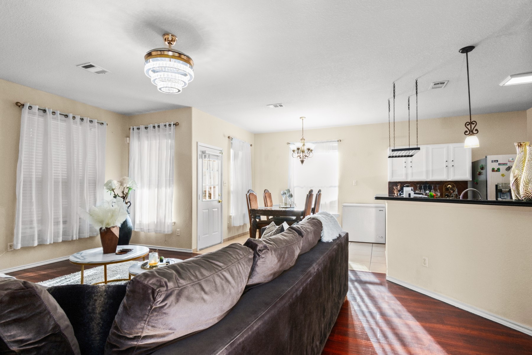 18823 Appletree Ridge Road Houston, TX 77084 - Photo 4 of 22 a living room with furniture and a wooden floor