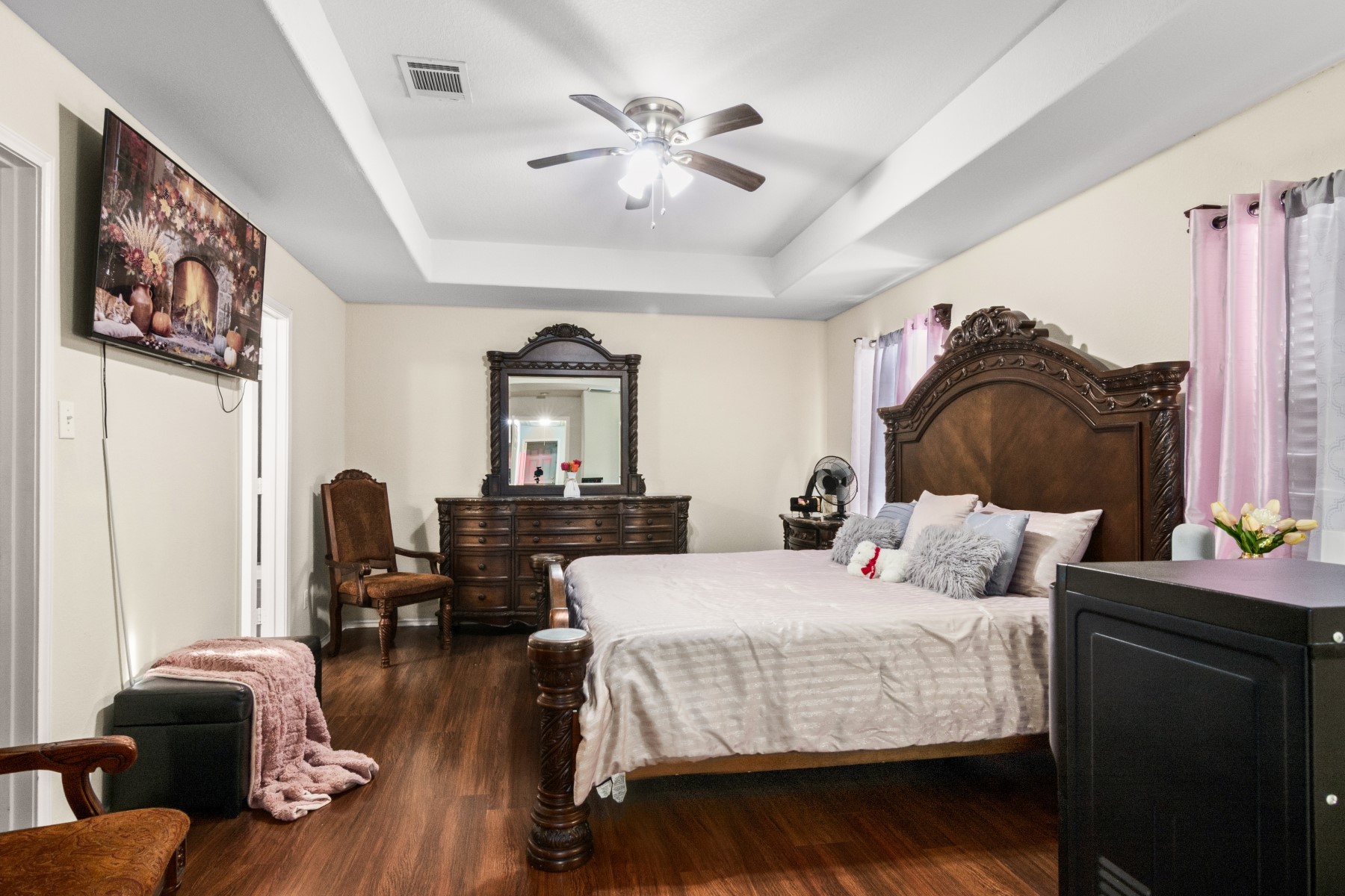 18823 Appletree Ridge Road Houston, TX 77084 - Photo 10 of 22 a bedroom with furniture and a window