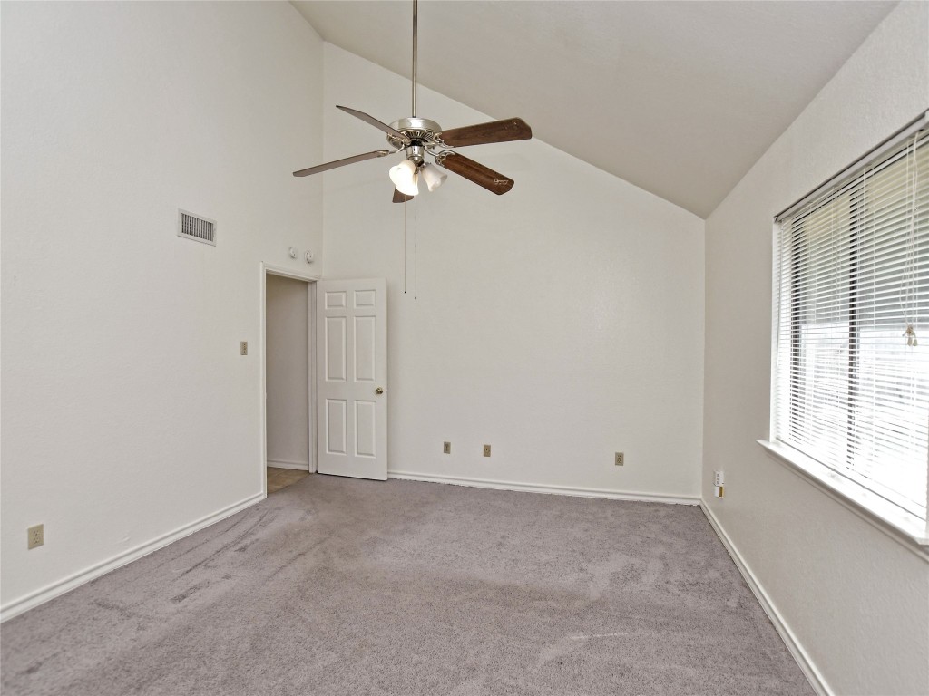 803 Valley View Drive, Unit B Pflugerville, TX 78660 - Photo 11 of 22 en view of an empty room with a window