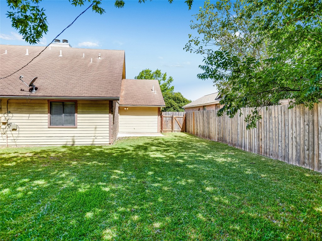 803 Valley View Drive, Unit B Pflugerville, TX 78660 - Photo 19 of 22 a house view with a garden space