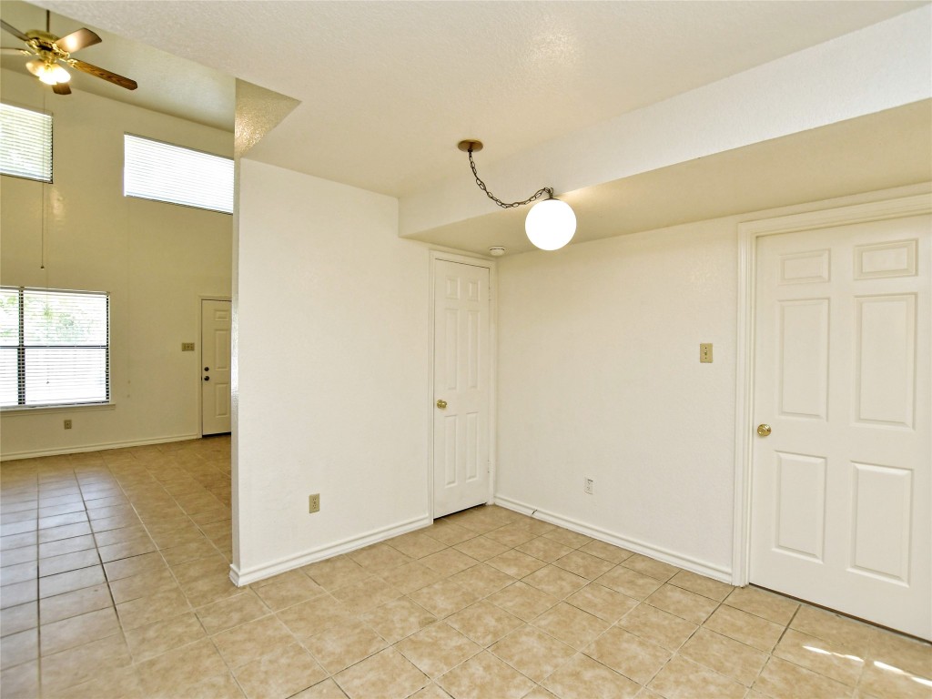 803 Valley View Drive, Unit B Pflugerville, TX 78660 - Photo 7 of 22 a view of a livingroom with a chandelier