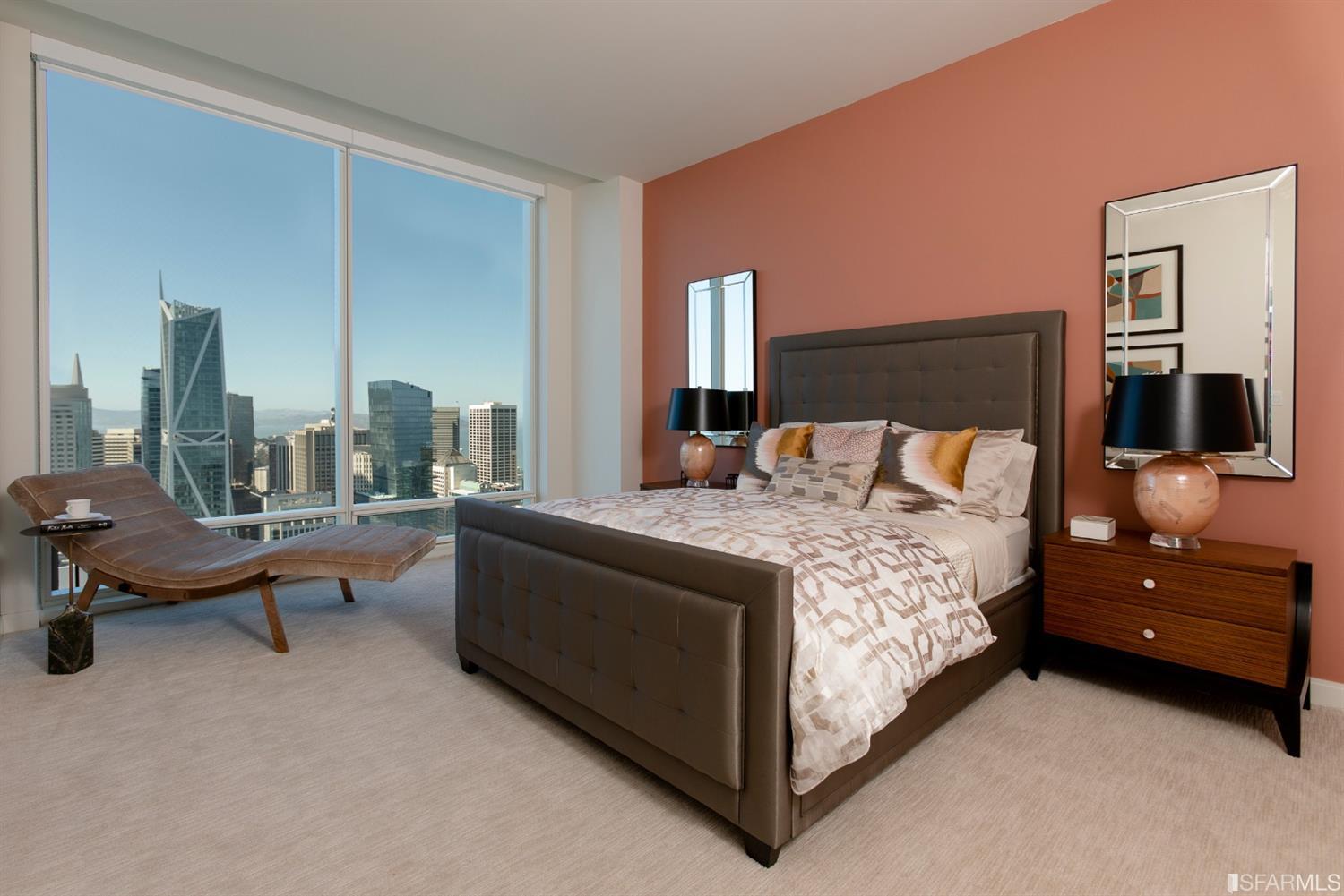 401 Harrison Street, Unit PH49A San Francisco, CA 94105 - Photo 5 of 14 a bedroom with a bed and large window