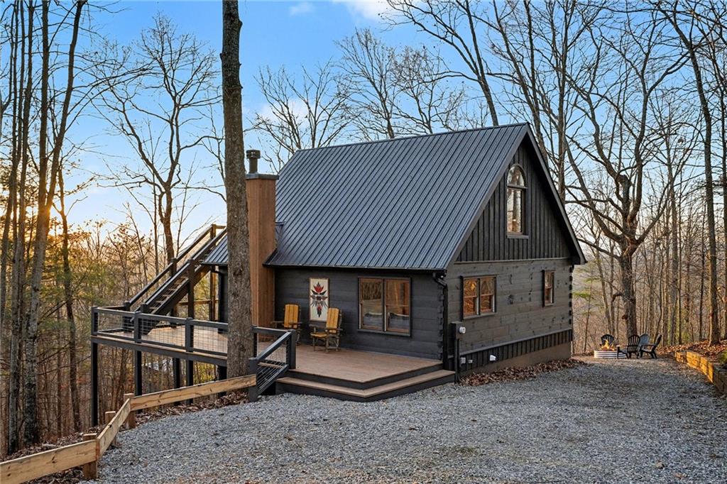 Undisclosed Address Morganton, GA 30560 - Photo 27 of 45 a front view of a house with garden