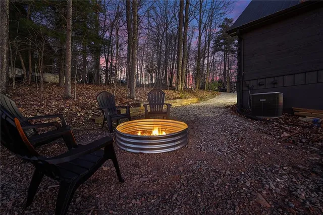 a view of a house with a small yard