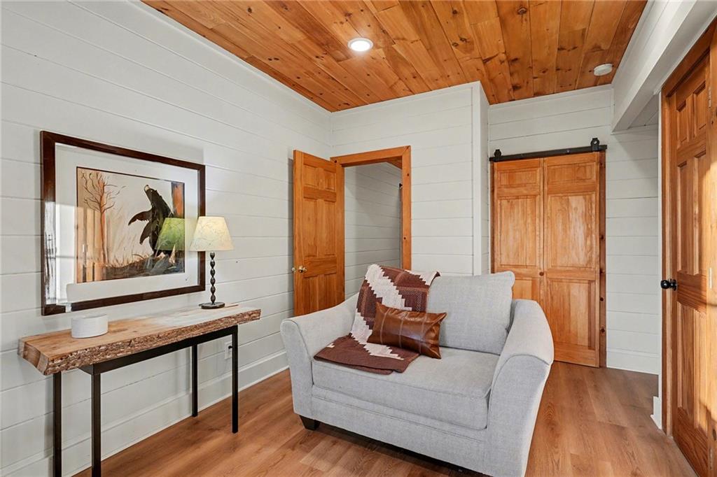 Undisclosed Address Morganton, GA 30560 - Photo 32 of 45 a living room with furniture and a window